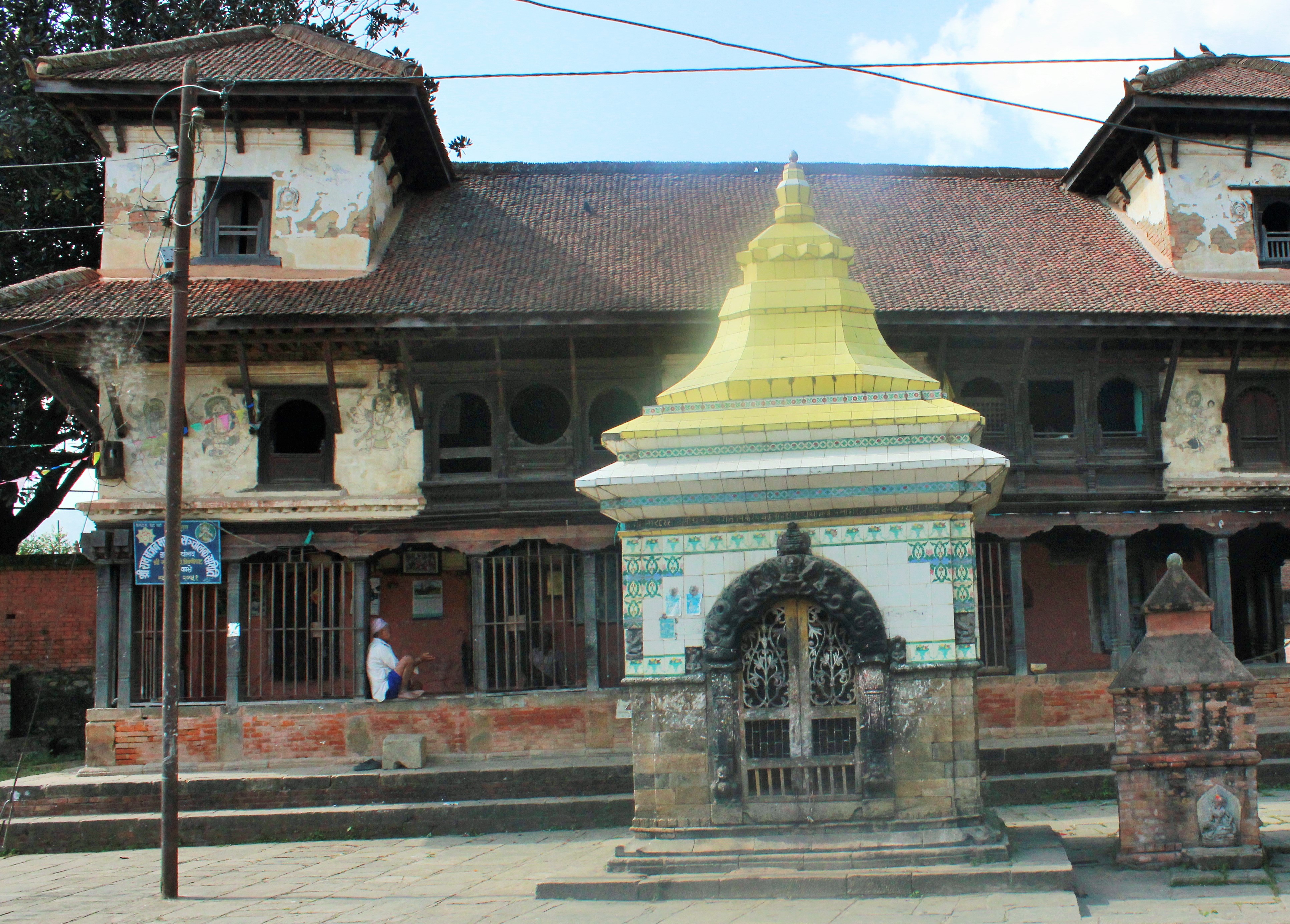 Temple complex with religious paintings on the wall.